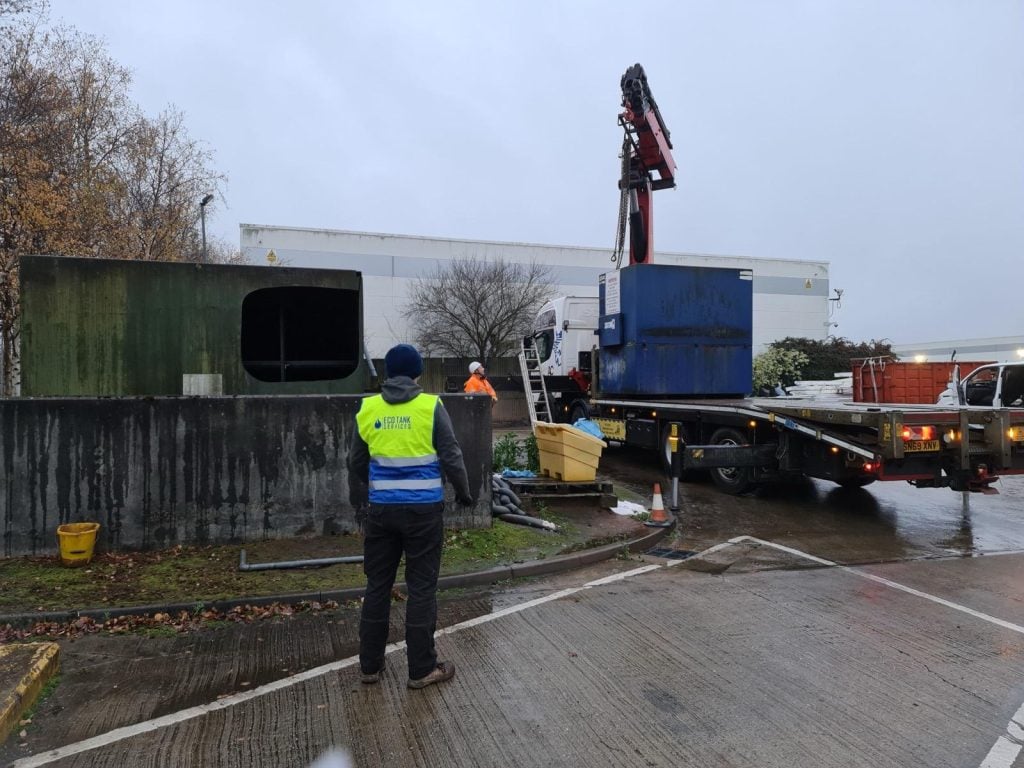 Eco Tank Services team carrying out the safe disposal of old oil tanks using professional lifting equipment